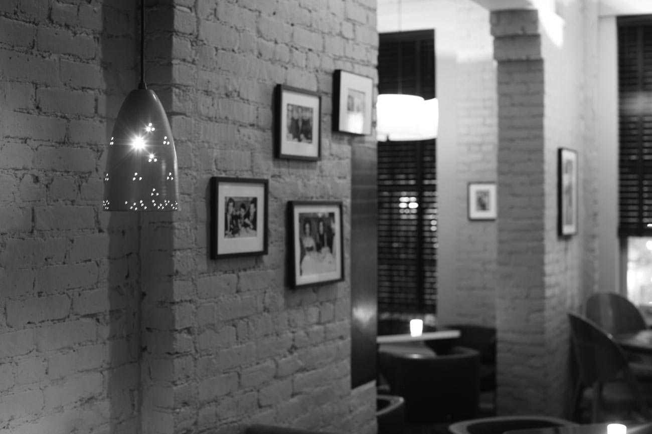 Lamp above a banquette in Bar Centrale, 324 West 46th Street, NYC.